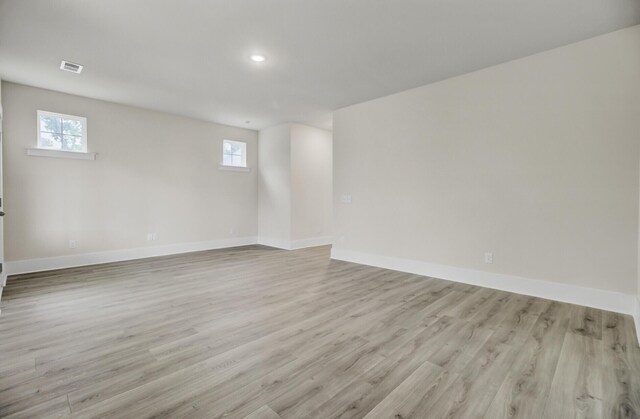 3029 Robeson Trce, Johns Island, SC 29455 - spare room with baseboards, light wood finished floors, plenty of natural light, and recessed lighting
