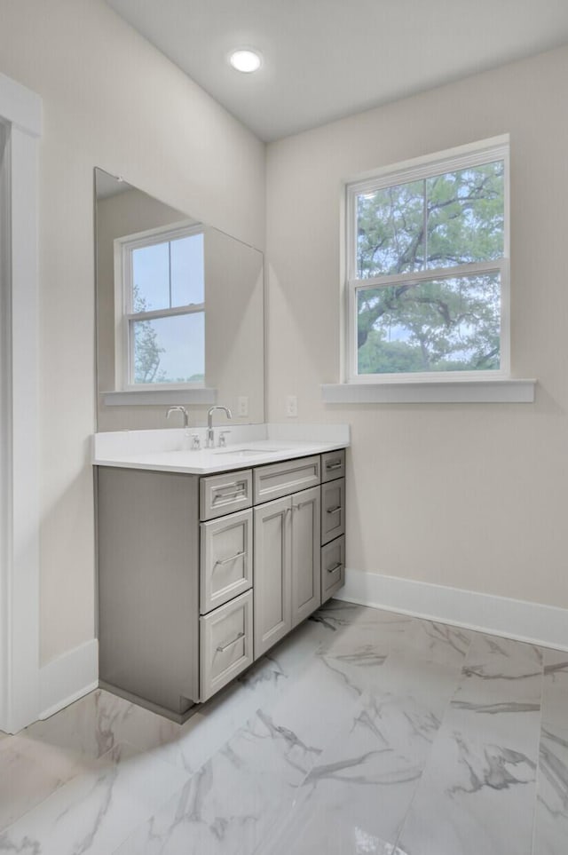3029 Robeson Trce, Johns Island, SC 29455 - bathroom featuring vanity, baseboards, marble finish floors, and recessed lighting