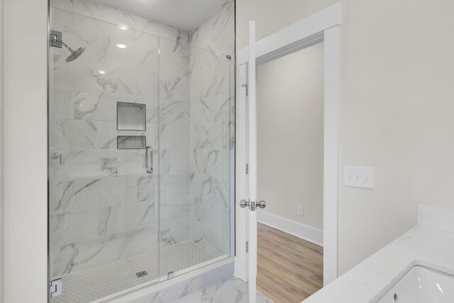 3029 Robeson Trce, Johns Island, SC 29455 - bathroom with a marble finish shower, marble look tile flooring, baseboards, vanity, and recessed lighting