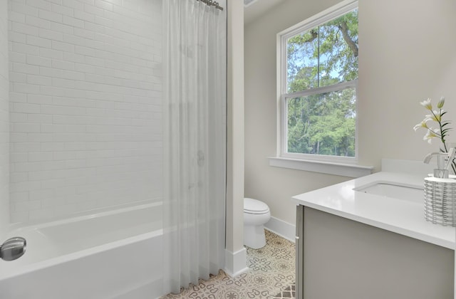 3029 Robeson Trce, Johns Island, SC 29455 - bathroom featuring vanity, toilet, baseboards, and shower / bath combination with curtain