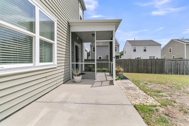 9706 Fanning Basket Ln, Ladson, SC 29456 - view of patio with fence and a residential view