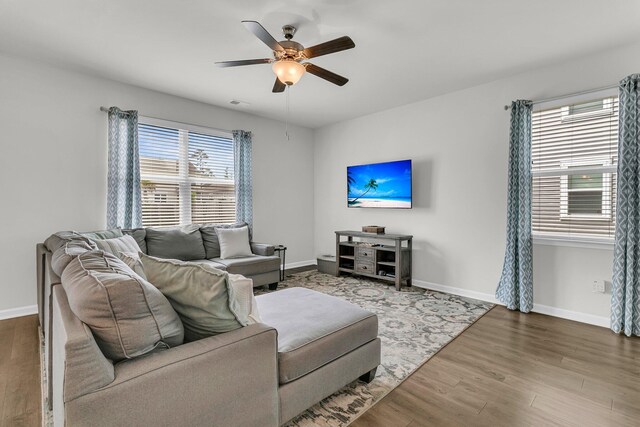 9706 Fanning Basket Ln, Ladson, SC 29456 - living area with baseboards, a ceiling fan, wood finished floors, and visible vents