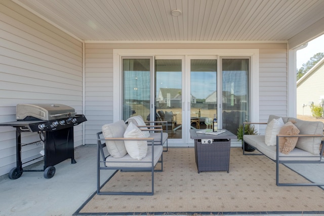 view of patio featuring a grill