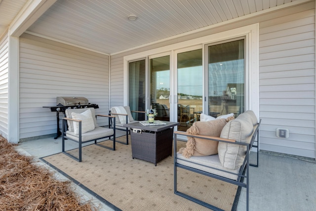 view of patio featuring a grill and an outdoor living space