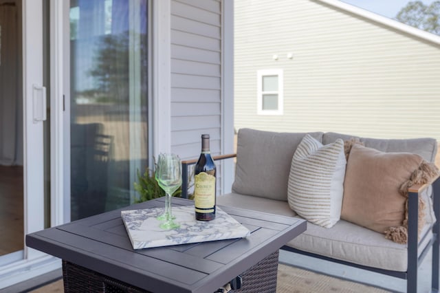 deck with outdoor dining area