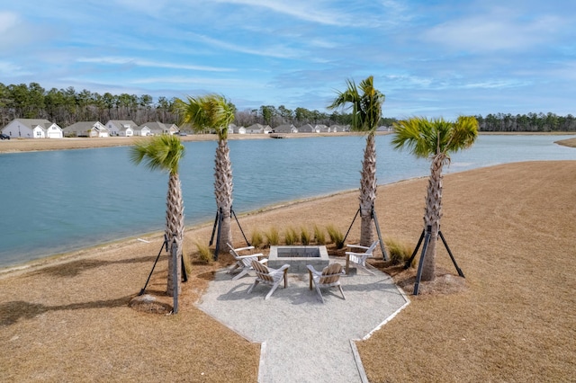 water view with an outdoor fire pit