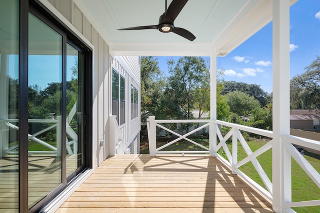 wooden terrace with ceiling fan