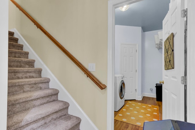 interior space featuring washer / clothes dryer and wood-type flooring