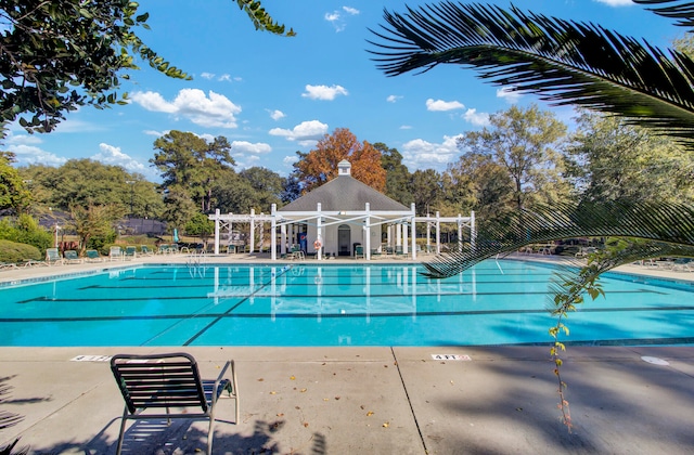 view of swimming pool featuring a gazebo