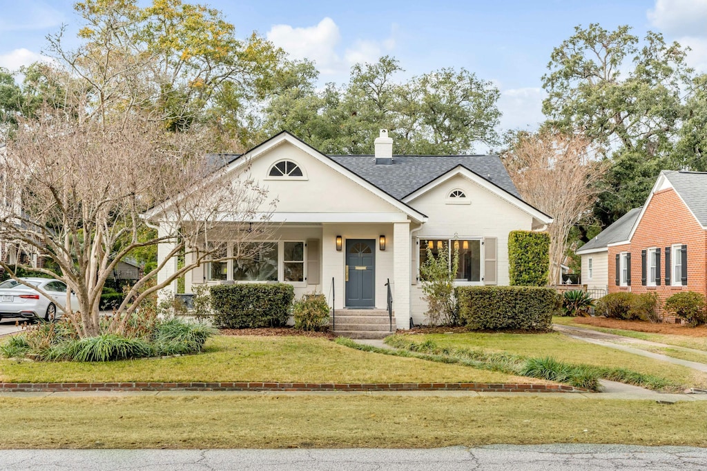 view of front of house with a front yard