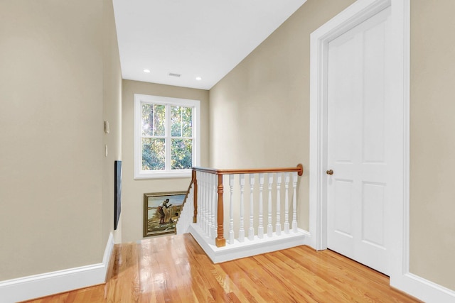 hall with light wood-type flooring