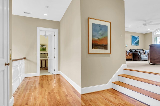 corridor featuring light hardwood / wood-style floors