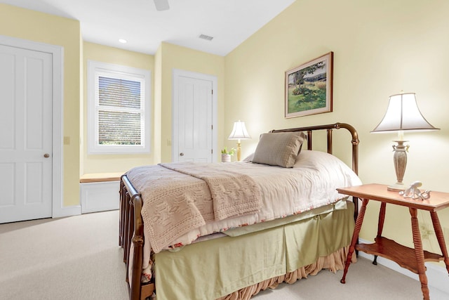 carpeted bedroom with ceiling fan