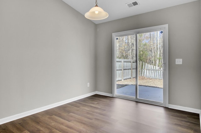 unfurnished room featuring dark hardwood / wood-style floors