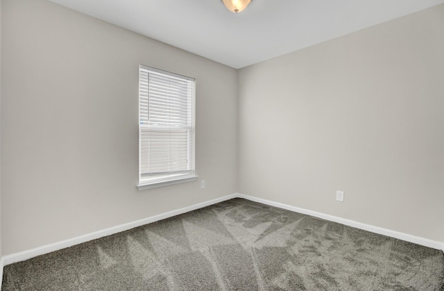 unfurnished room with carpet floors