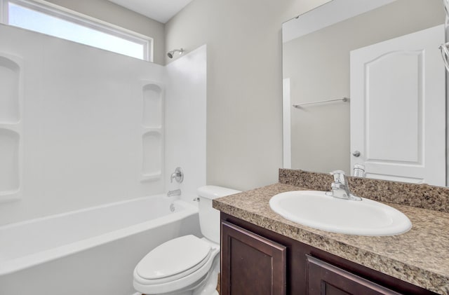 full bathroom with toilet,  shower combination, and vanity