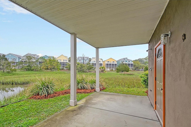 view of patio / terrace featuring a water view