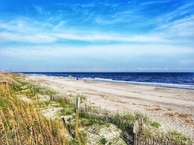 property view of water featuring a view of the beach