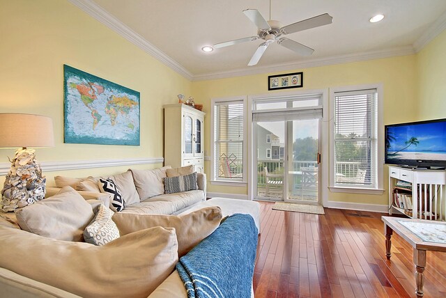 204 Michigan Ave Unit D2, Folly Beach, SC 29439 - living room with ornamental molding, baseboards, dark wood-style floors, and a ceiling fan