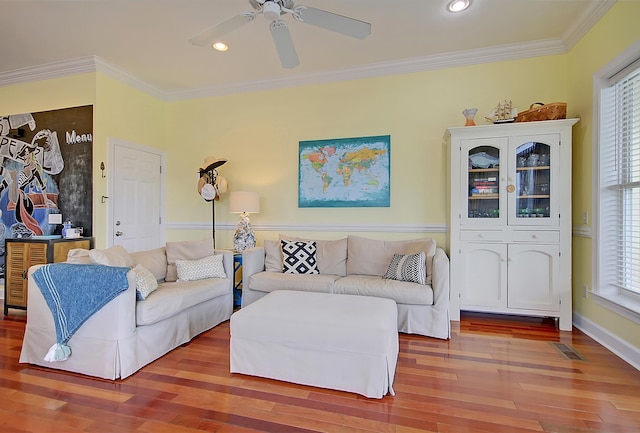 204 Michigan Ave Unit D2, Folly Beach, SC 29439 - living room with wood finished floors, plenty of natural light, crown molding, ceiling fan, and recessed lighting