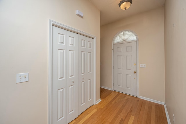 foyer with light wood-type flooring