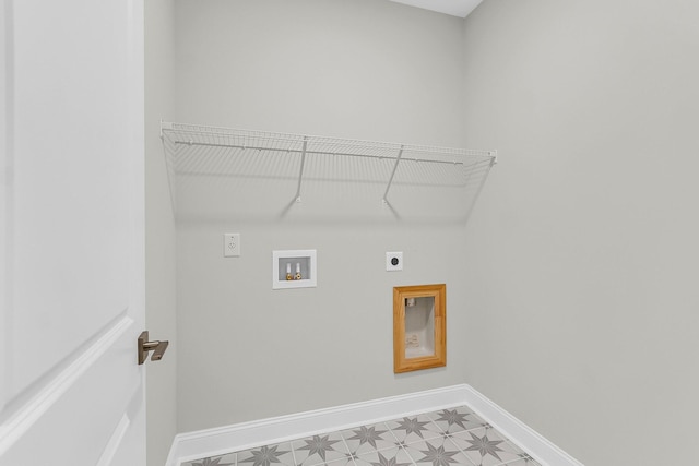 laundry area featuring washer hookup, light floors, electric dryer hookup, laundry area, and baseboards