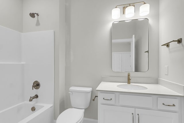 full bathroom with toilet, bathing tub / shower combination, and vanity