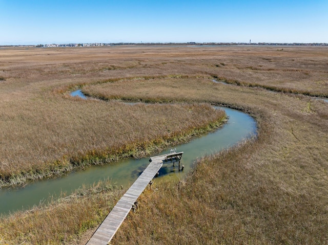 bird's eye view featuring a rural view and a water view