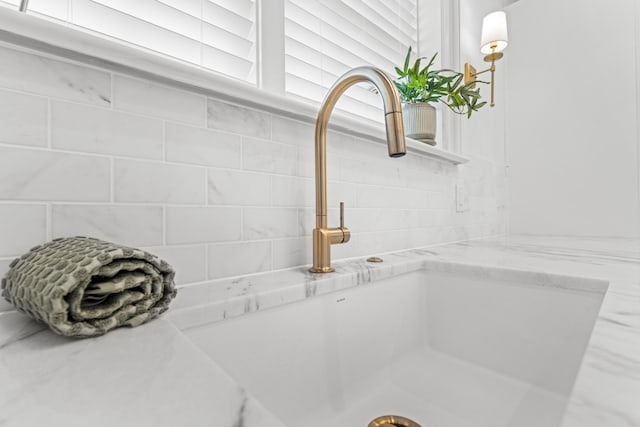 80 Smith St, Charleston, SC 29401 - detailed view of a sink and decorative backsplash