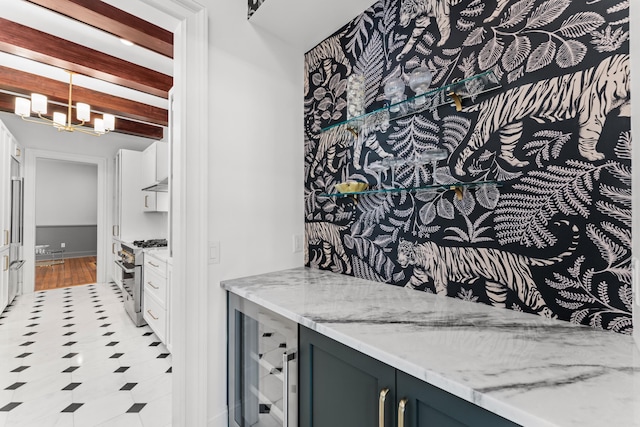 80 Smith St, Charleston, SC 29401 - bathroom with vanity, a chandelier, tile patterned floors, beverage cooler, and beam ceiling