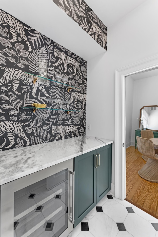 80 Smith St, Charleston, SC 29401 - indoor dry bar featuring beverage cooler and light floors