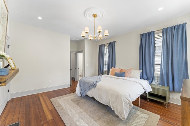 80 Smith St, Charleston, SC 29401 - bedroom with a chandelier, multiple windows, wood-type flooring, baseboards, and recessed lighting