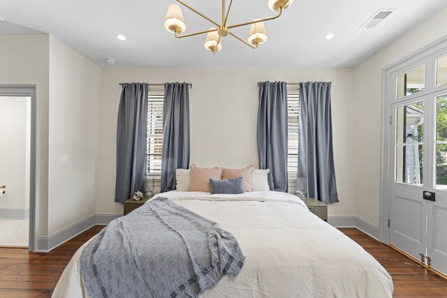 80 Smith St, Charleston, SC 29401 - bedroom with a chandelier, dark wood-style flooring, baseboards, and recessed lighting