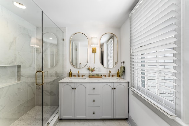 80 Smith St, Charleston, SC 29401 - full bathroom featuring double vanity, a stall shower, and a baseboard radiator