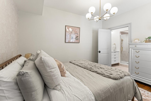 80 Smith St, Charleston, SC 29401 - bedroom featuring wood finished floors and a chandelier
