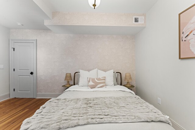 80 Smith St, Charleston, SC 29401 - bedroom featuring dark wood-style flooring and baseboards