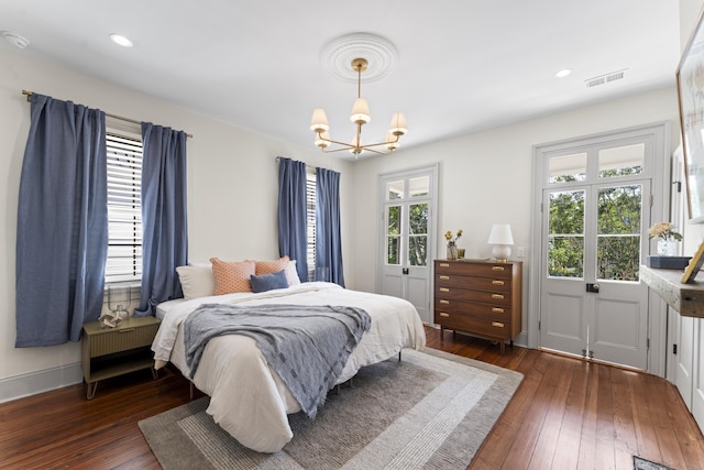 80 Smith St, Charleston, SC 29401 - bedroom featuring a chandelier, wood-type flooring, recessed lighting, and baseboards