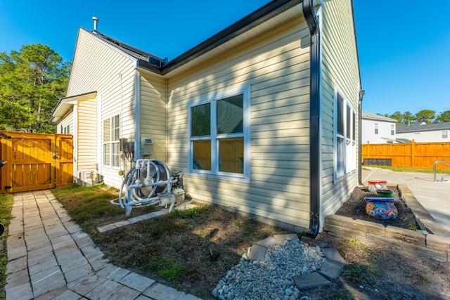 rear view of house featuring a patio