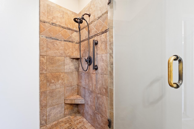 bathroom featuring an enclosed shower