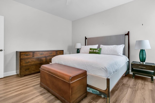 bedroom with light hardwood / wood-style floors