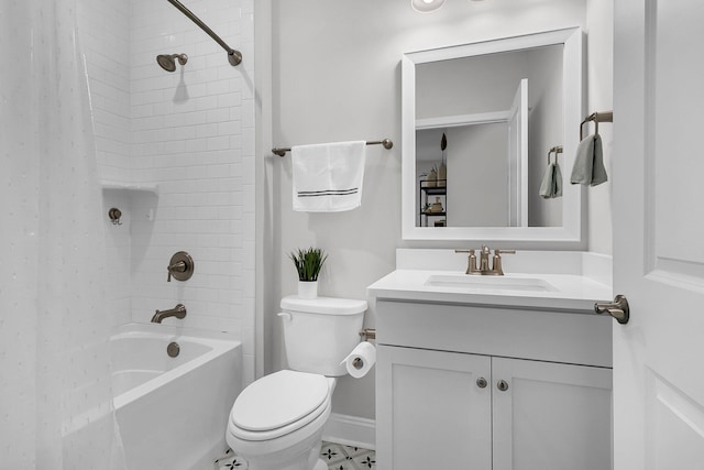 full bathroom featuring vanity, toilet, and tiled shower / bath combo