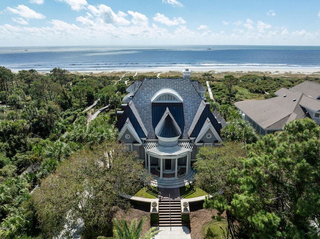 bird's eye view featuring a water view and a view of the beach