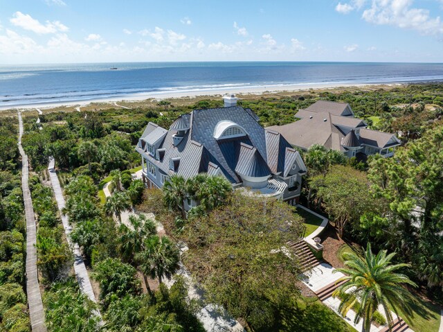 bird's eye view featuring a view of the beach and a water view