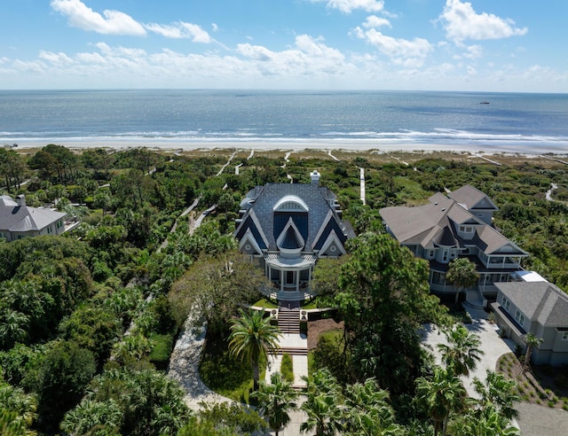 drone / aerial view featuring a view of the beach and a water view