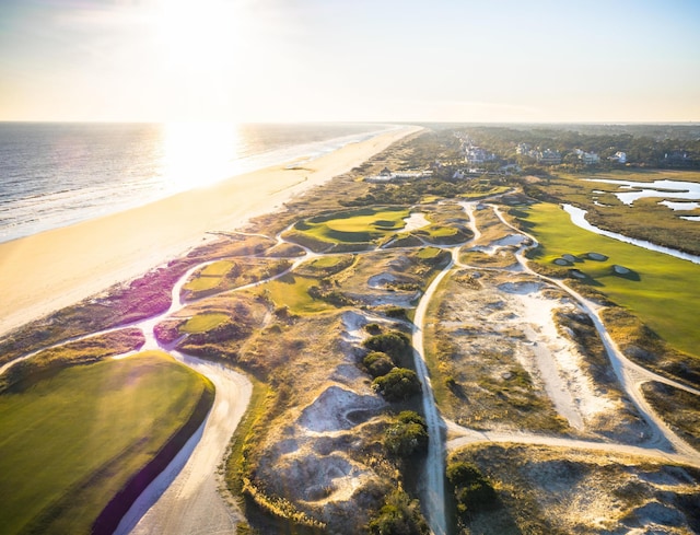 bird's eye view featuring a water view and a view of the beach