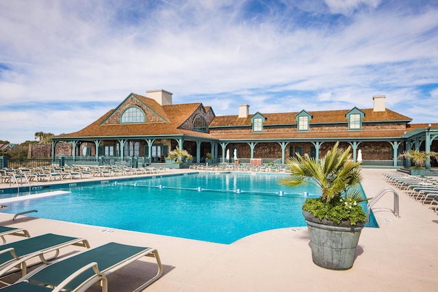 view of swimming pool with a patio area