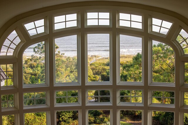 doorway to outside with a water view