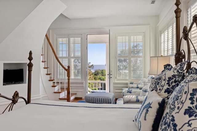 bedroom featuring multiple windows