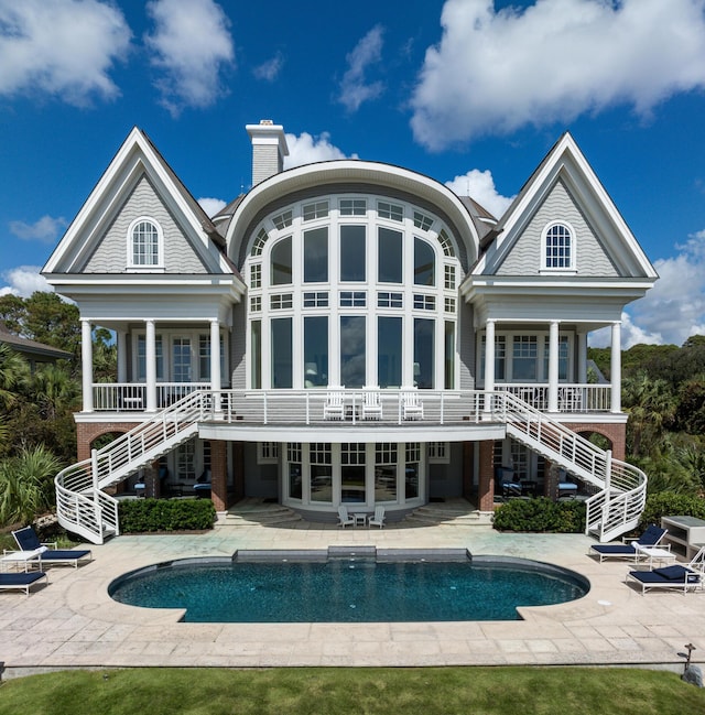 rear view of property with a patio