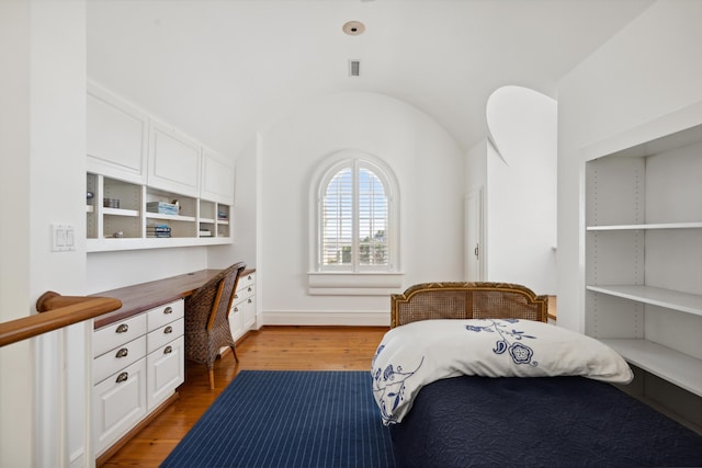 bedroom featuring hardwood / wood-style floors